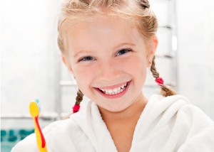 girl with toothbrush