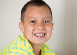 Boy brushing his teeth.
